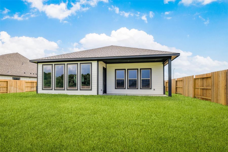 Exterior details and patio area of a home in , Sealy (Image 3).
