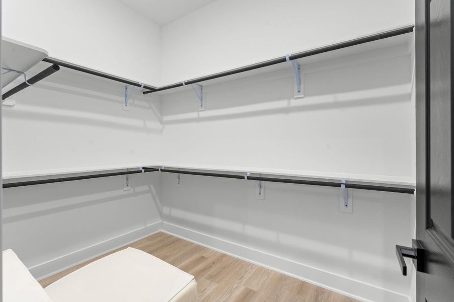 Walk-in closet for ample storage space. Walk-in closet for ample storage space.