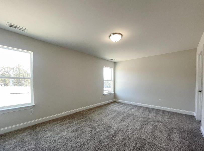 Spacious, unfurnished interior of a new home in Founders Club, Moore (Image 16).