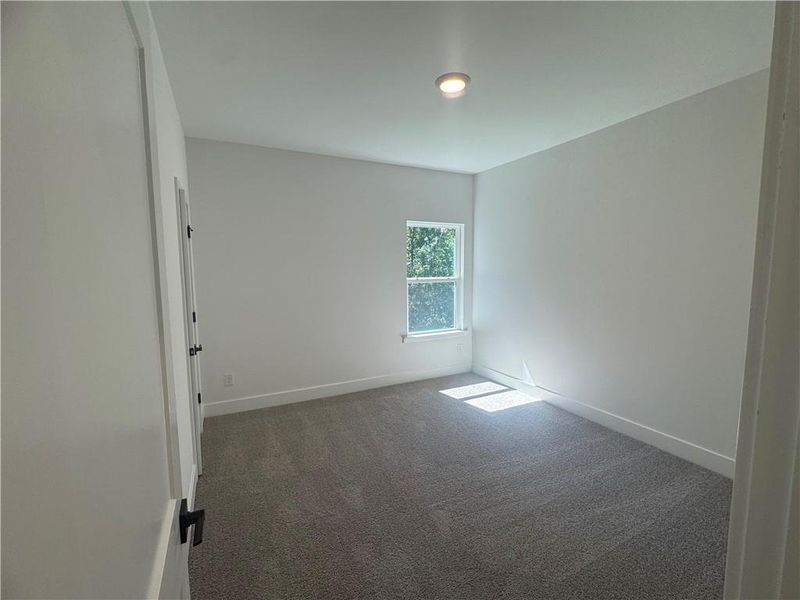 Spacious, unfurnished interior of a new home in The Fields of Walnut Creek, Pendergrass (Image 30).