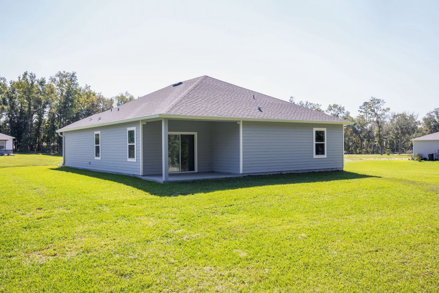 Exterior details and patio area of a home in Heritage Station, Punta Gorda (Image 4).