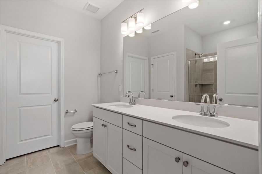 Furnished interior view inside a new home in Ovation at Sweetbrier, Durham (Image 13).