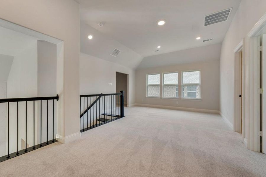 Representative unfurnished interior of a home built from the Brandonwood by Grand Homes in Edgewater, Fate (Image 23).