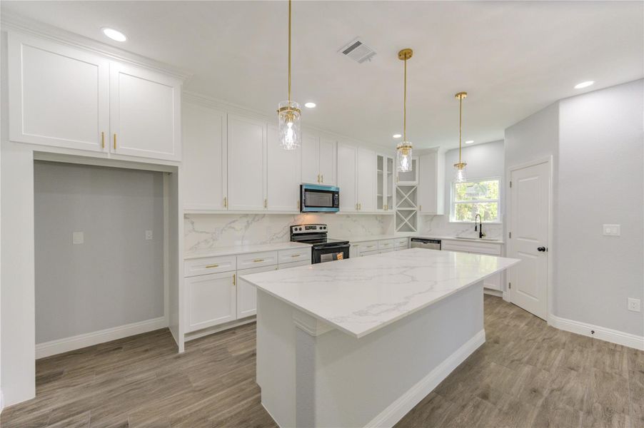 Furnished interior view inside a new home in , Woodbranch (Image 16).
