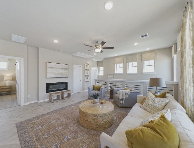 Representative furnished interior of a home built from the Storybrooke by Chesmar Homes in Sienna Courtyard, Missouri City (Image 6).