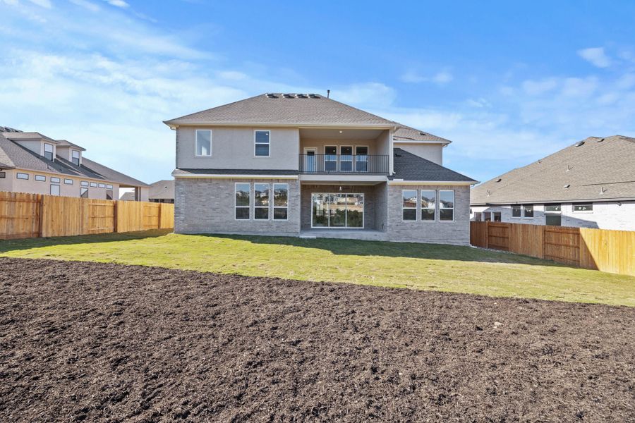Representative exterior photo of a completed home built from the Remington by Chesmar Homes in Broken Oak, Georgetown, TX (Image 2). Representative exterior photo of a completed home built from the Remington by Chesmar Homes in Broken Oak, Georgetown, TX (Image 2).