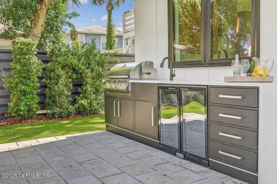 Exterior details and patio area of a home in , Neptune Beach (Image 47).