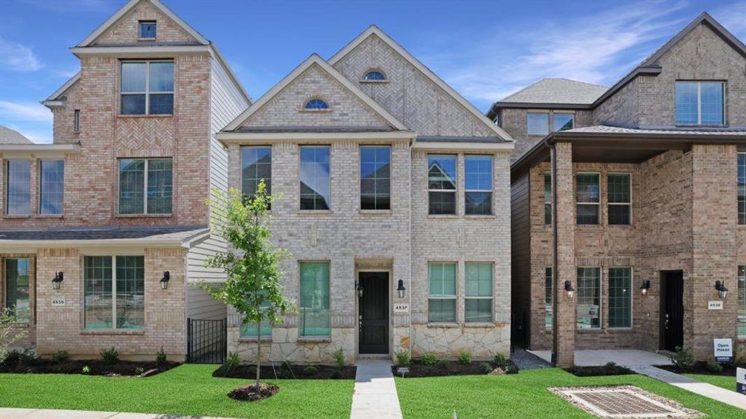 Front exterior of a new home in The Avenue, Allen, TX, highlighting curb appeal (Image 1). Front exterior of a new home in The Avenue, Allen, TX, highlighting curb appeal (Image 1).