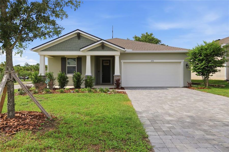 Front exterior of a new home in Grandview Gardens, Deland, FL, highlighting curb appeal (Image 23).