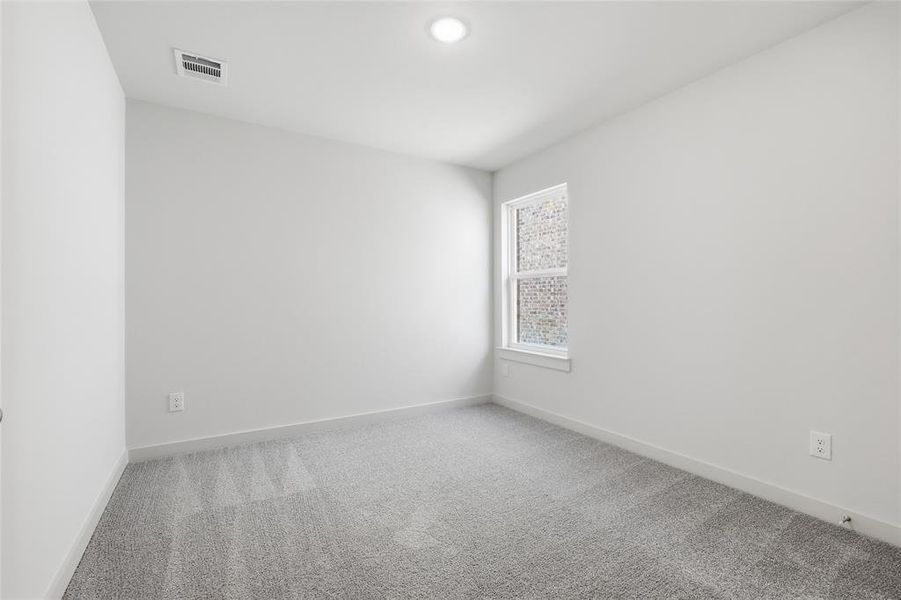 Spare room with carpet and recessed lighting Spare room with carpet and recessed lighting