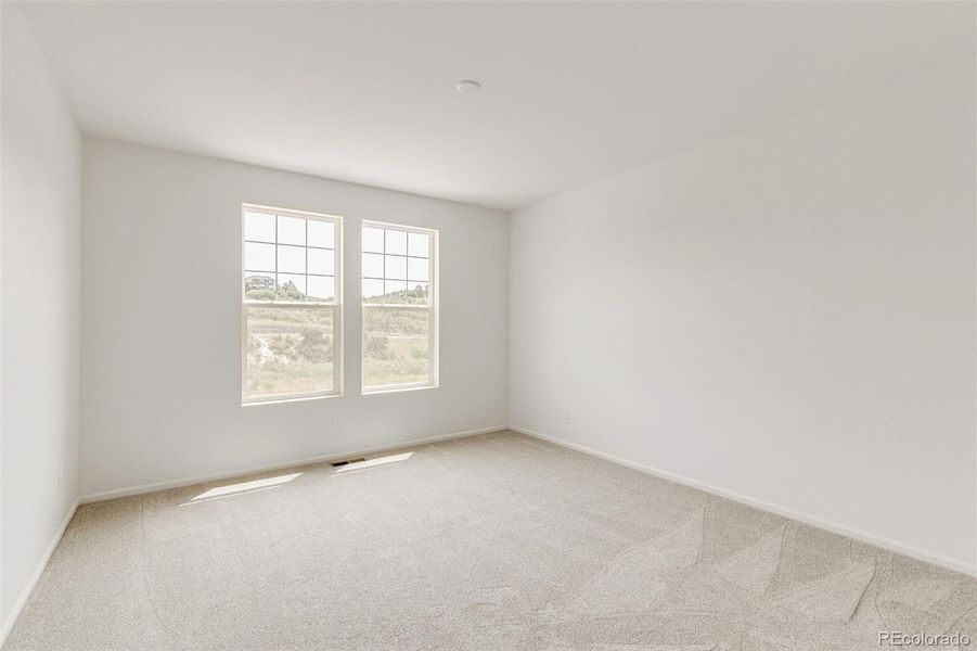 Spacious, unfurnished interior of a new home in Terrain Oak Valley, Castle Rock (Image 34).
