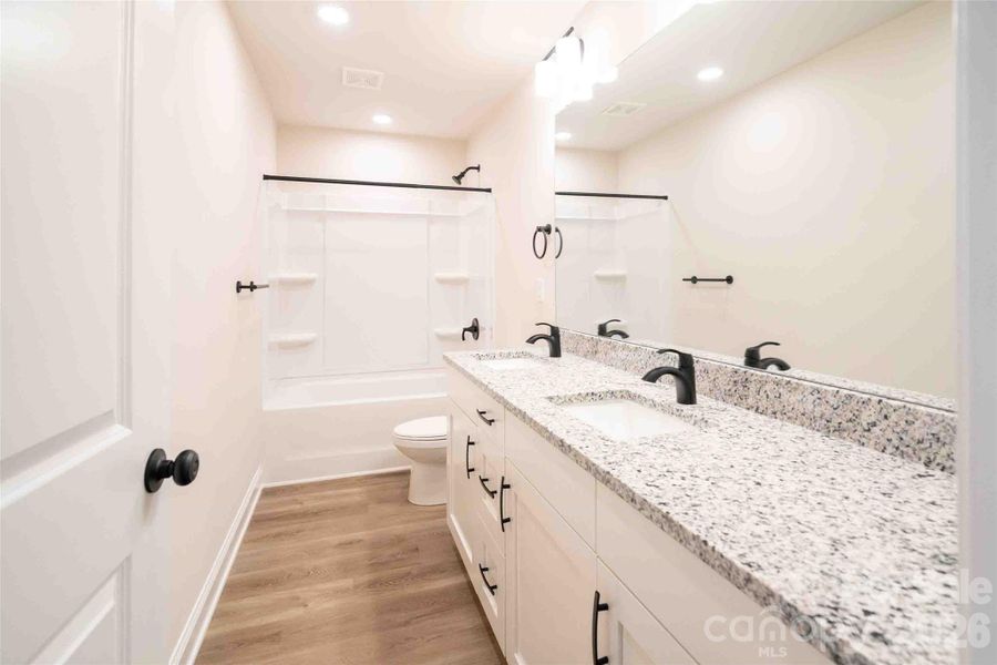 Furnished interior view inside a new home in , Mooresville (Image 7).