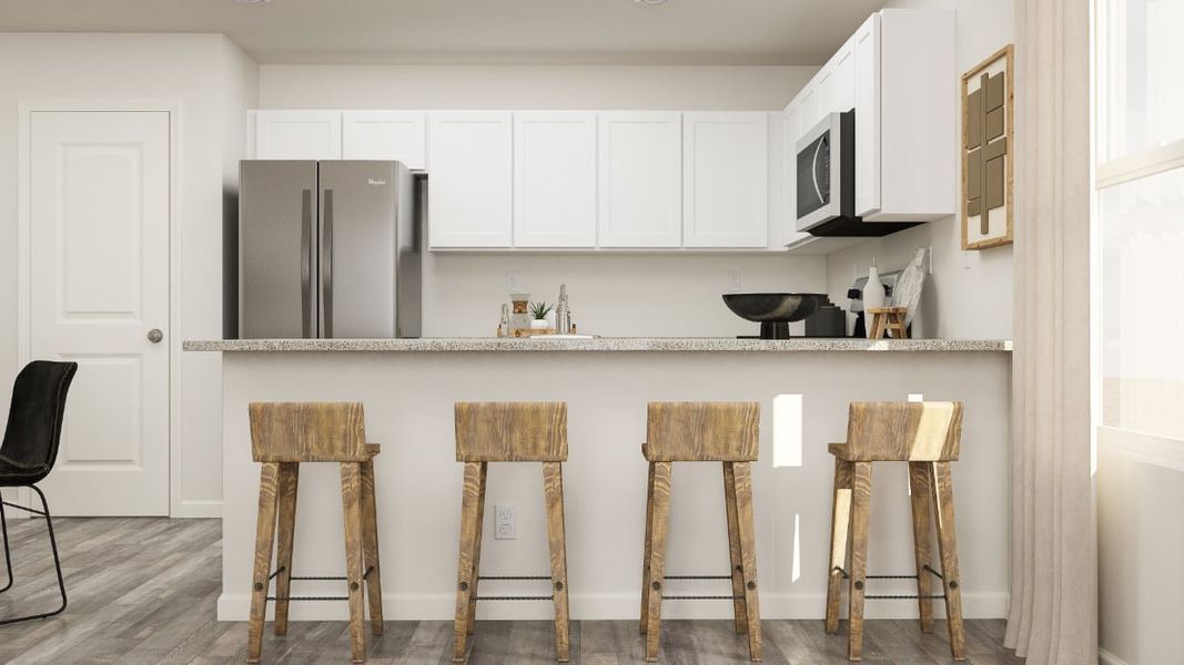 A kitchen with stools and a table.