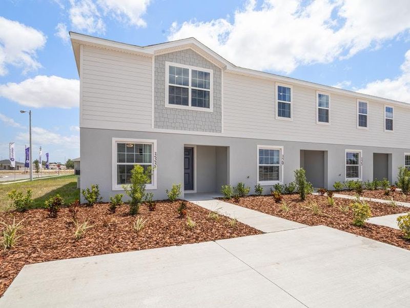 This affordable new construction townhome is offered exclusively at Harbor at Lake Henry in Winter Haven, Florida.