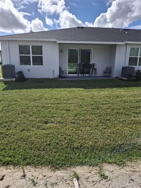 Exterior details and patio area of a home in , Palm Bay (Image 3). Exterior details and patio area of a home in , Palm Bay (Image 3).