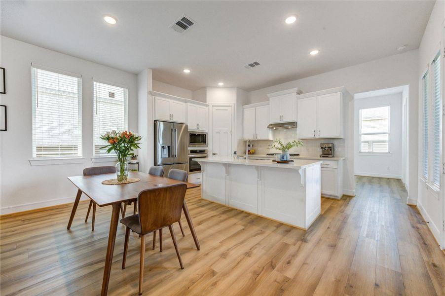 Furnished interior view inside a new home in Easthaven at Bridgeland Central, Cypress (Image 34).