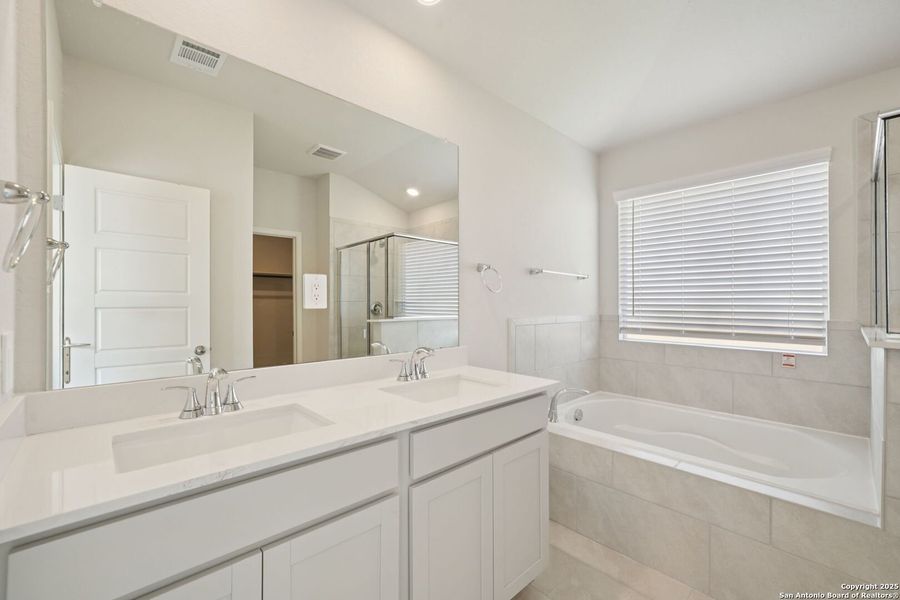 Furnished interior view inside a new home in Estancia Ranch - Premier Series, San Antonio (Image 10).