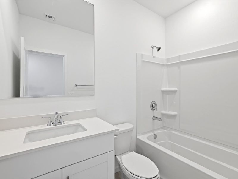 Furnished interior view inside a new home in Mountain View Estates Reserve Series, Buckeye (Image 5).