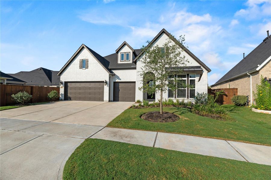 Front exterior of a new home in , Katy, TX, highlighting curb appeal (Image 2).
