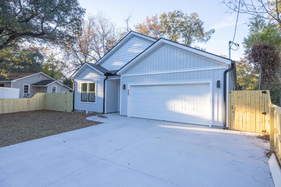 Front exterior of a new home in , North Charleston, SC, highlighting curb appeal (Image 30).