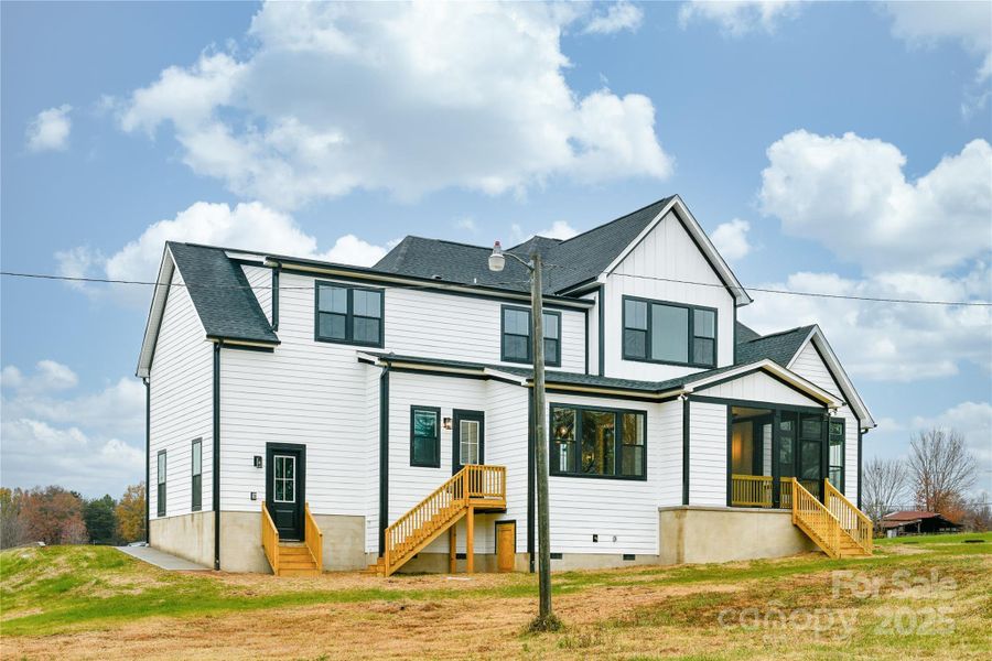 Front exterior of a new home in , Statesville, NC, highlighting curb appeal (Image 1).