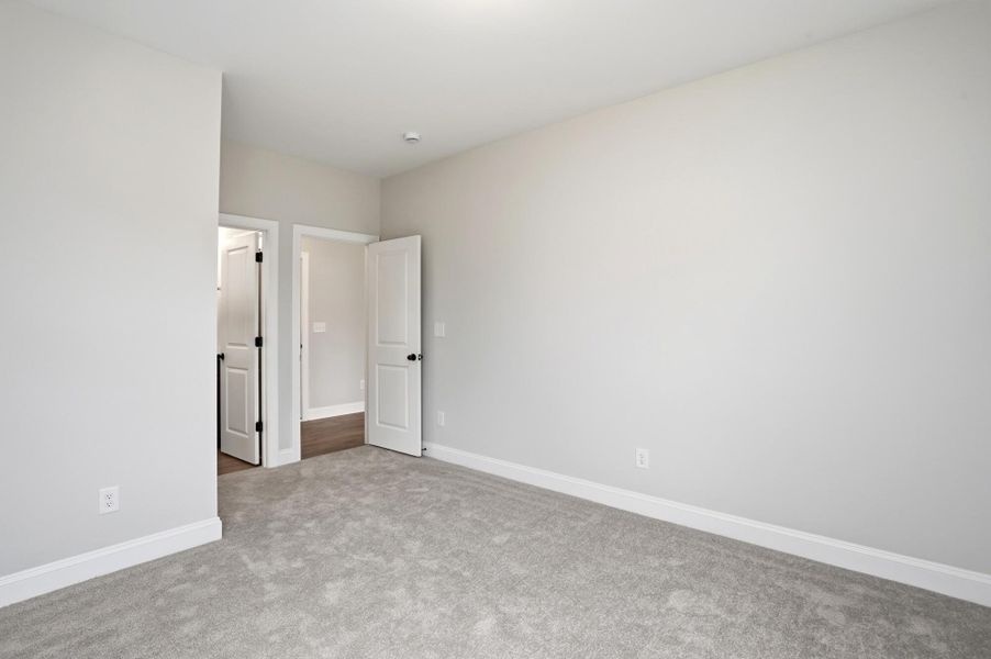 Spacious, unfurnished interior of a new home in Carrington, Stanley (Image 54).