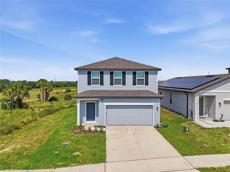 Front exterior of a new home in , Lake Hamilton, FL, highlighting curb appeal (Image 17). Front exterior of a new home in , Lake Hamilton, FL, highlighting curb appeal (Image 17).