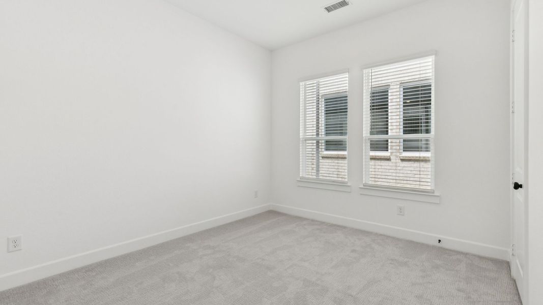 Representative unfurnished interior of a home built from the Elise by Normandy Homes in Rainwater Crossing, Celina (Image 11).