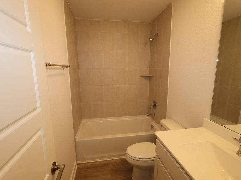 Furnished interior view inside a new home in Lone Star Landing, Montgomery (Image 12).