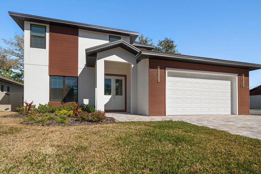 Front exterior of a new home in , Largo, FL, highlighting curb appeal (Image 31).
