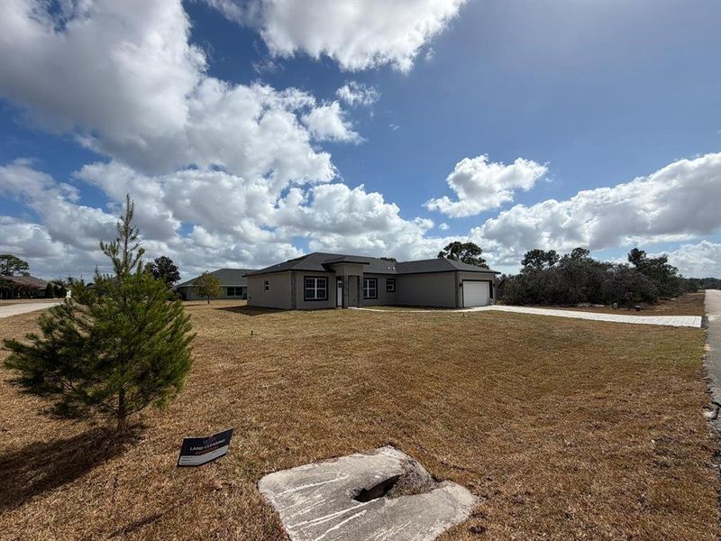 Exterior details and patio area of a home in , Sebring (Image 27).