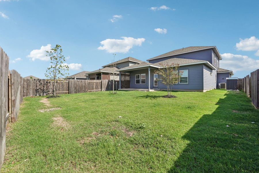 Exterior details and patio area of a home in Waterstone Crossing, Kyle (Image 4).