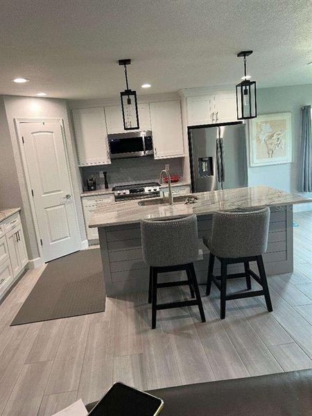 Furnished interior view inside a new home in , Englewood (Image 6).