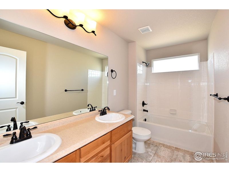 Furnished interior view inside a new home in Union Colony West, Greeley (Image 14).