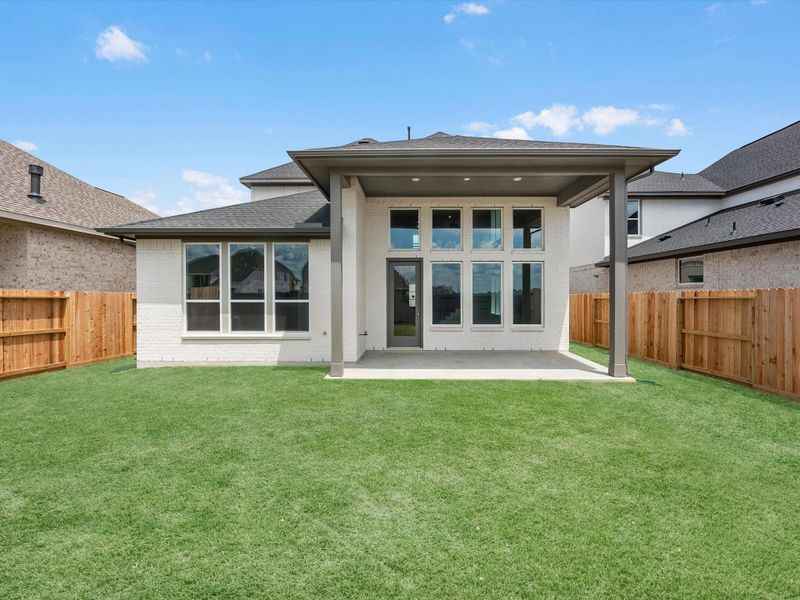Exterior details and patio area of a home in Jubilee 50′, Hockley (Image 3).