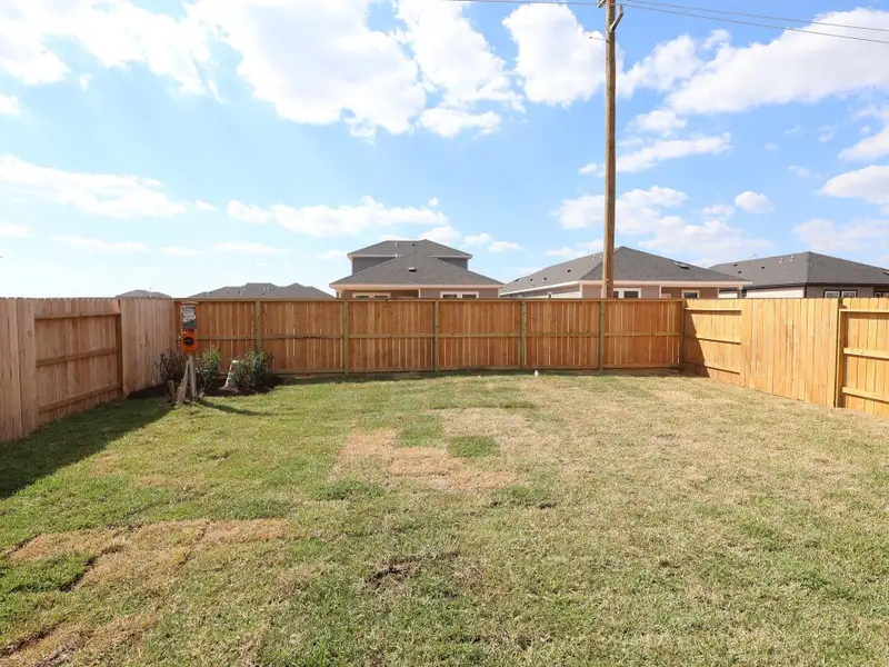Exterior details and patio area of a home in Marvida, Cypress (Image 2).