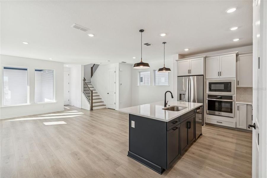 Furnished interior view inside a new home in Weslyn Park in Sunbridge 34', St. Cloud (Image 14).