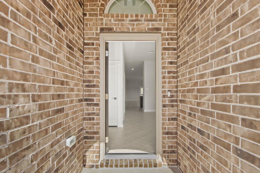 Exterior details and patio area of a home in Oakwood Ranch, Willis (Image 2).