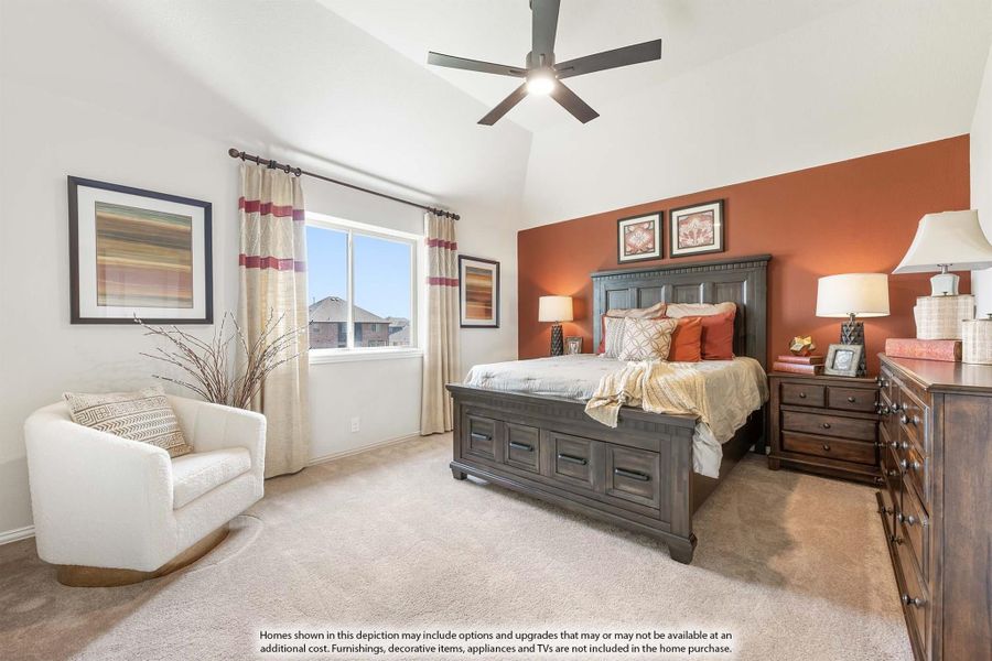 Bedroom with vaulted ceiling, ceiling fan, rust-colored accent wall, dark wood bed frame, and carpet flooring Bedroom with vaulted ceiling, ceiling fan, rust-colored accent wall, dark wood bed frame, and carpet flooring