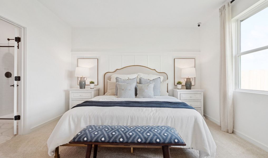 Primary suite with decorated feature wall