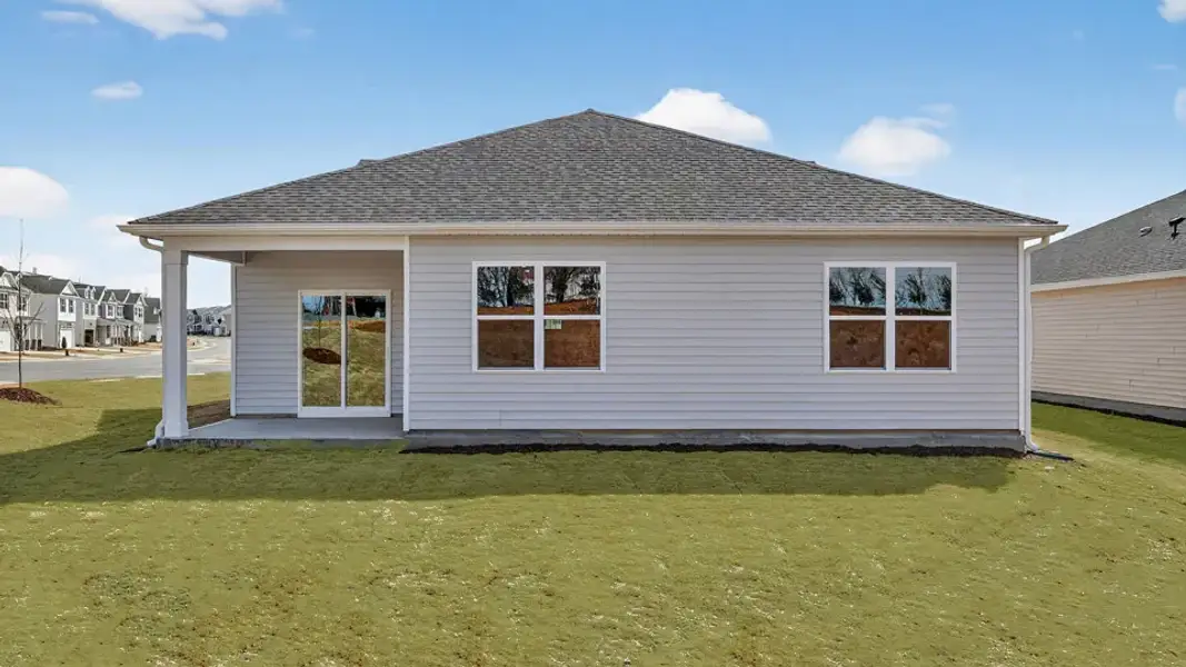Exterior details and patio area of a home in Honeycutt Oaks, Angier (Image 20).