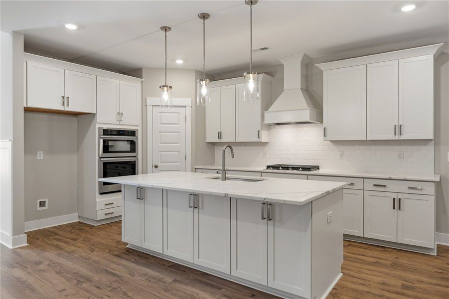 A well-appointed kitchen showcases an expansive is