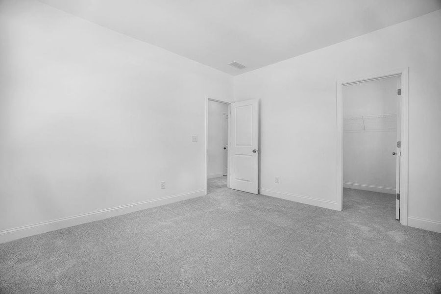 Spacious, unfurnished interior of a new home in Bailey Fence, Dacula (Image 28).