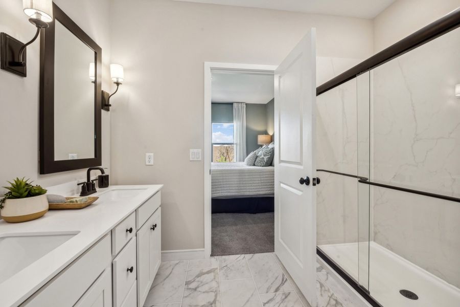 Primary bath with dual sinks and matte black appliances