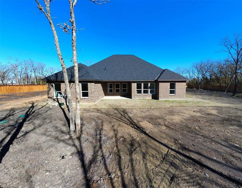 Back of property with a patio area