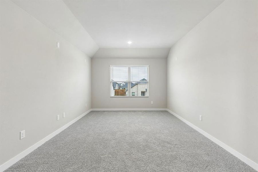 Media Room in the Winters home plan by Trophy Signature Homes – REPRESENTATIVE PHOTO