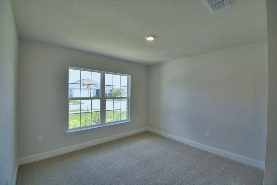 Spacious, unfurnished interior of a new home in Villamar, Winter Haven (Image 20).
