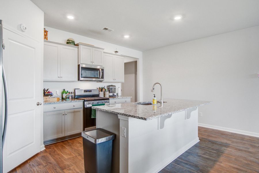 Furnished interior view inside a new home in Pine Hills at Cane Bay, Summerville (Image 7).