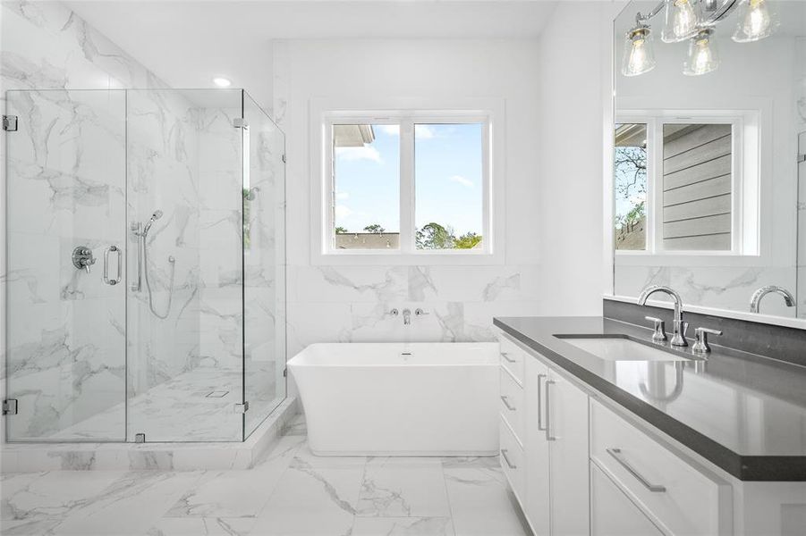 Another look at the primary bathroom. A small detail that I appreciate is the fact that the shower controls are at the entrance of the shower.