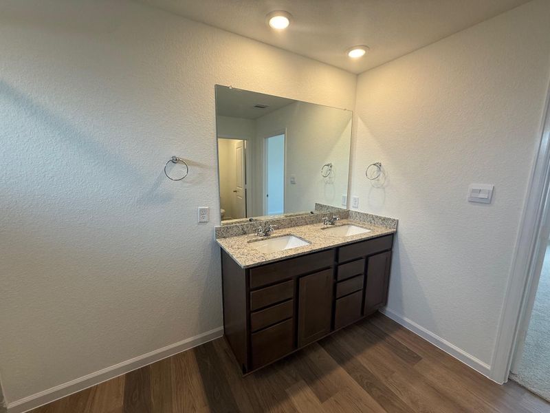 Furnished interior view inside a new home in Midtown Reserve, College Station (Image 9).